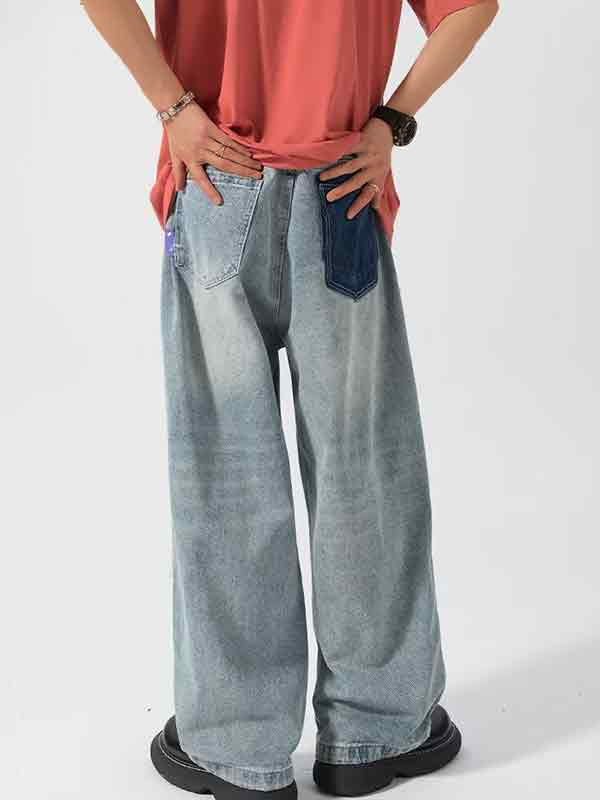 Lose Jeans für Herren im Vintage-Stil mit zerrissenen Aufnähern in Kontrastfarbe