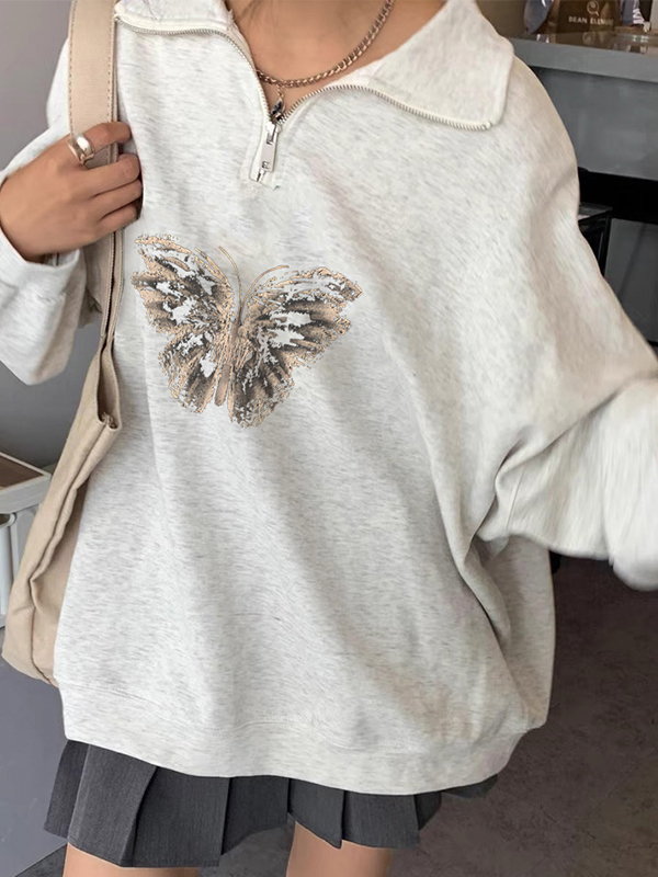 Sweatshirt mit Schmetterlingsdruck und Reverskragen und halbem Reißverschluss