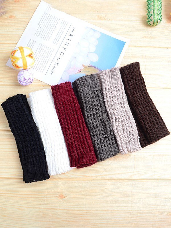 Fingerlose Strickhandschuhe mit Daumenlochdetail