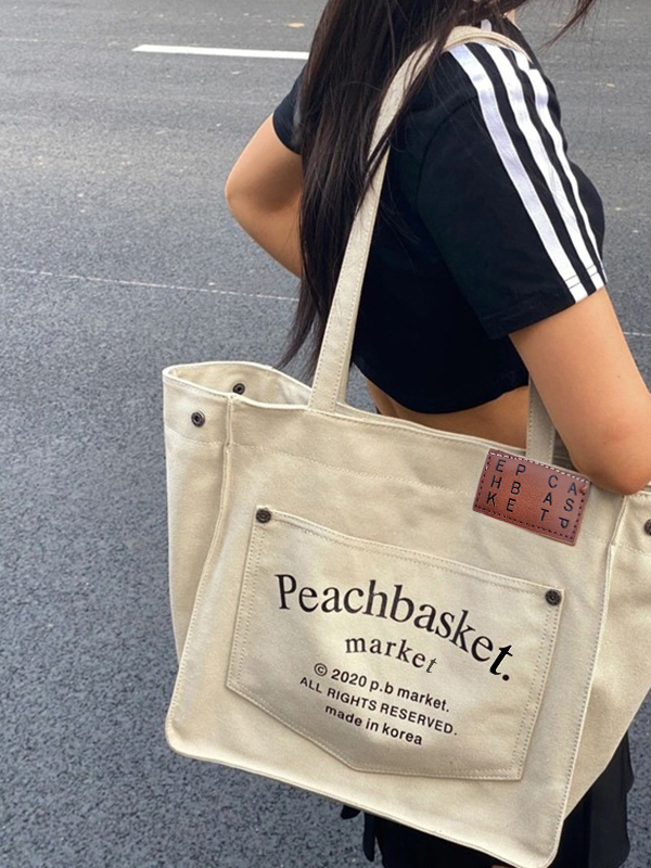 Tragetasche aus Canvas mit großem Fassungsvermögen und Buchstabendruck