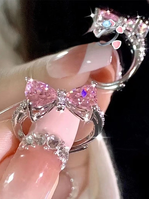 Rosafarbener Manschettenring mit Schleife